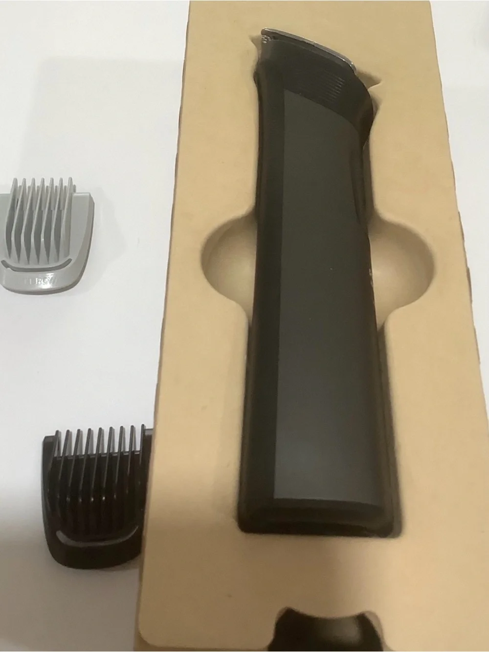 Philips Norelco ultimate precision All-in-One Trimmer- head face and body MG9526
